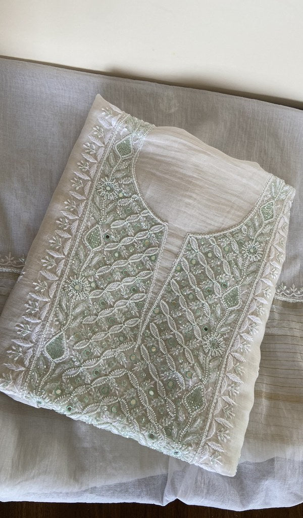 White mul chanderi kurta piece folded, gala work in front