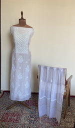 The set on the mannequin with its dupatta beside it