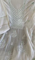 Fine chikankari on the white kurta