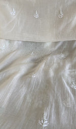 The dupatta spread out, white mul chanderi