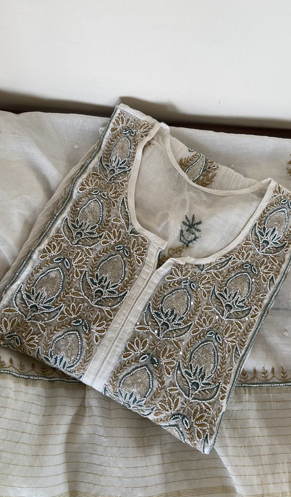 Ivory mul chanderi kurta piece folded, gala work in front