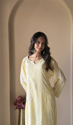 Yellow modal cotton, up close