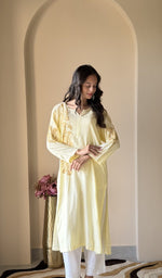 Yellow modal cotton kurti on the model