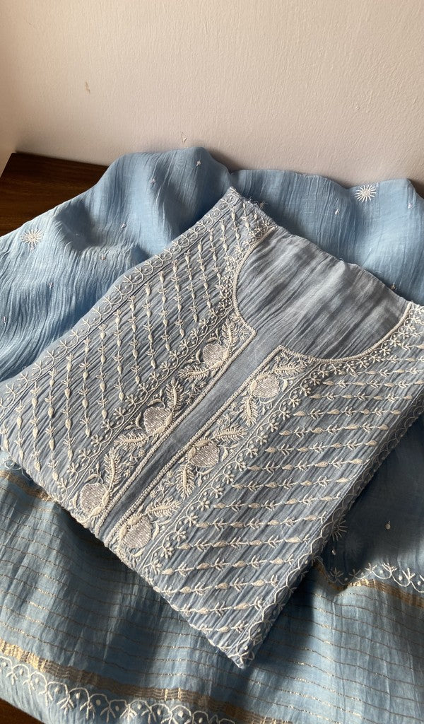 Blue pure mul chanderi kurta piece folded, fine do taar and teen taar chikankari on panel