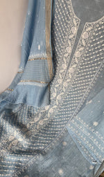 Motifs across the body of the blue kurta
