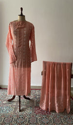 The set on the mannequin with its dupatta beside it