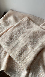 Light peach pure mul chanderi kurta piece folded, fine do taar and teen taar front jaal chikankari