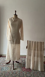 The set on the mannequin with its dupatta beside it
