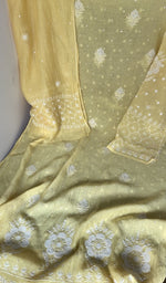 Motifs across the body of the yellow kurta
