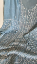 Motifs across the body of the blue kurta