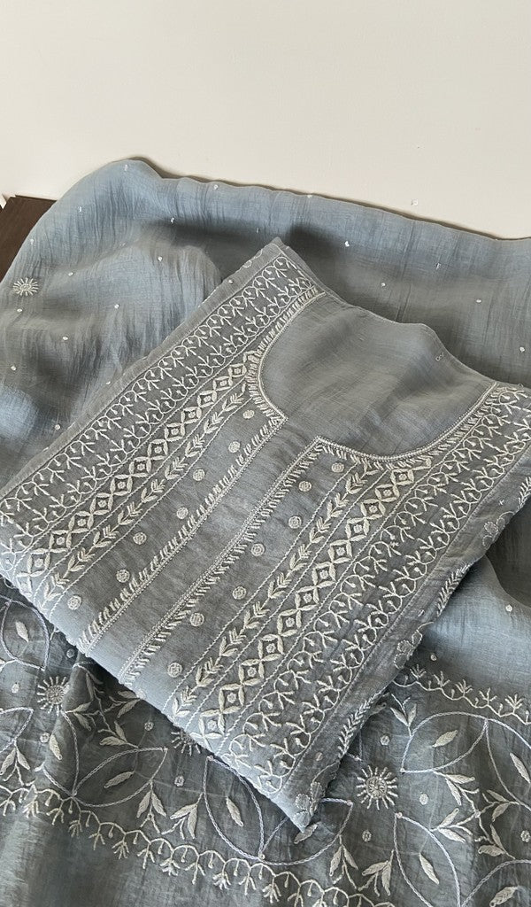Grey pure mul chanderi kurta piece folded, fine do taar and teen taar front jaal chikankari