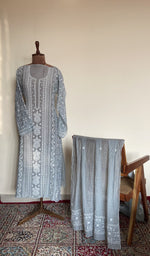 The set on the mannequin with its dupatta beside it