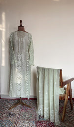 The set on the mannequin with its dupatta beside it