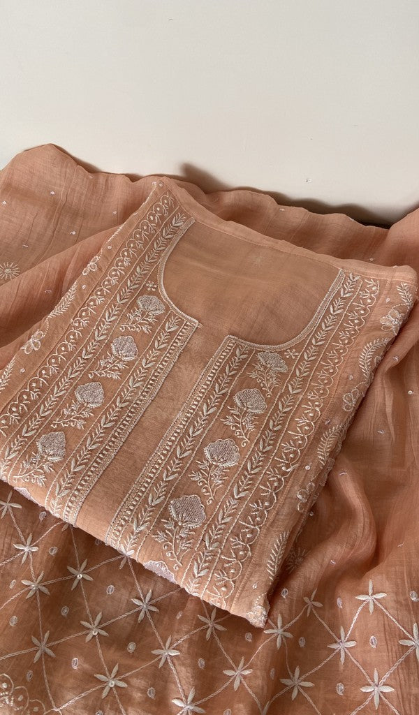 Peach pure mul chanderi kurta piece folded, fine do taar and teen taar front jaal chikankari