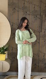 Pista Green short kurti on the model