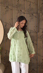 Pista Green short kurti, worn by the model