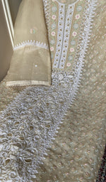 Cream organza silk laid out flat