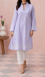 Lavender kurti from the front, styled with a white pant