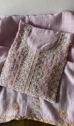 Folded kurta piece and dupatta, chikankari along the hem